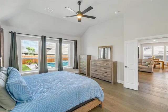 a kitchen with sink a stove and cabinets