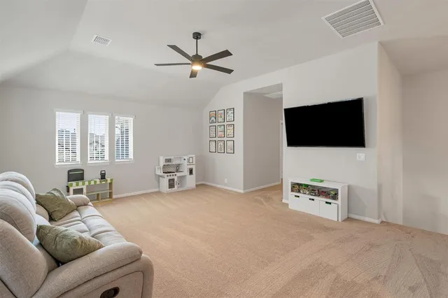 a view of storage and utility room with washer and dryer