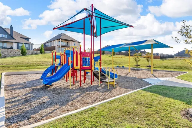 a view of outdoor space with trampoline
