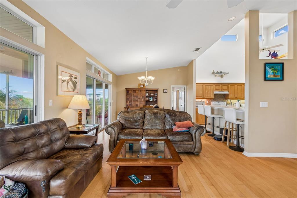 119 Burns Road Terra Ceia, FL 34250 - Photo 32 of 100 a living room with furniture a large window and table
