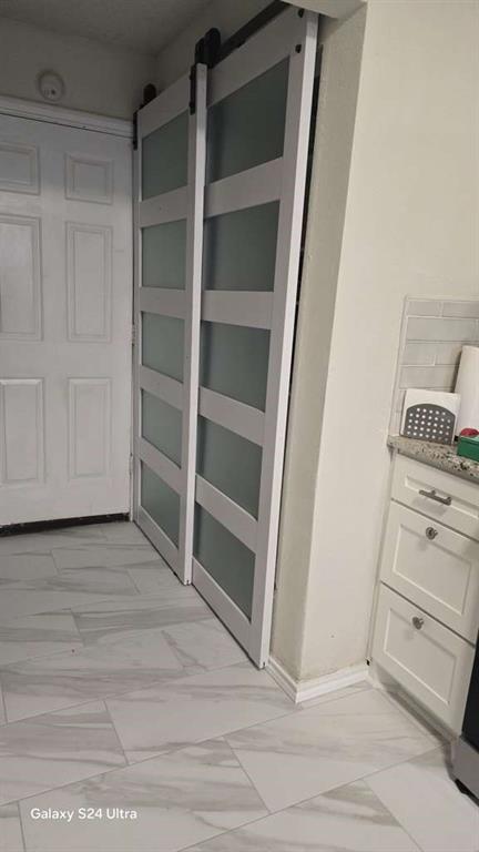 1631 Stratford Lane Duncanville, TX 75137 - Photo 6 of 9 a view of an empty walk in closet