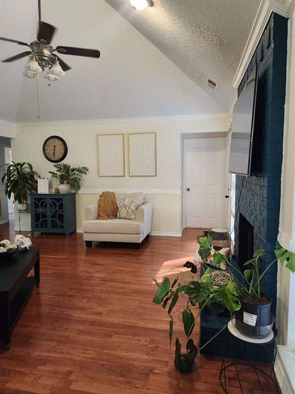 1631 Stratford Lane Duncanville, TX 75137 - Photo 8 of 9 a living room with furniture and a flat screen tv