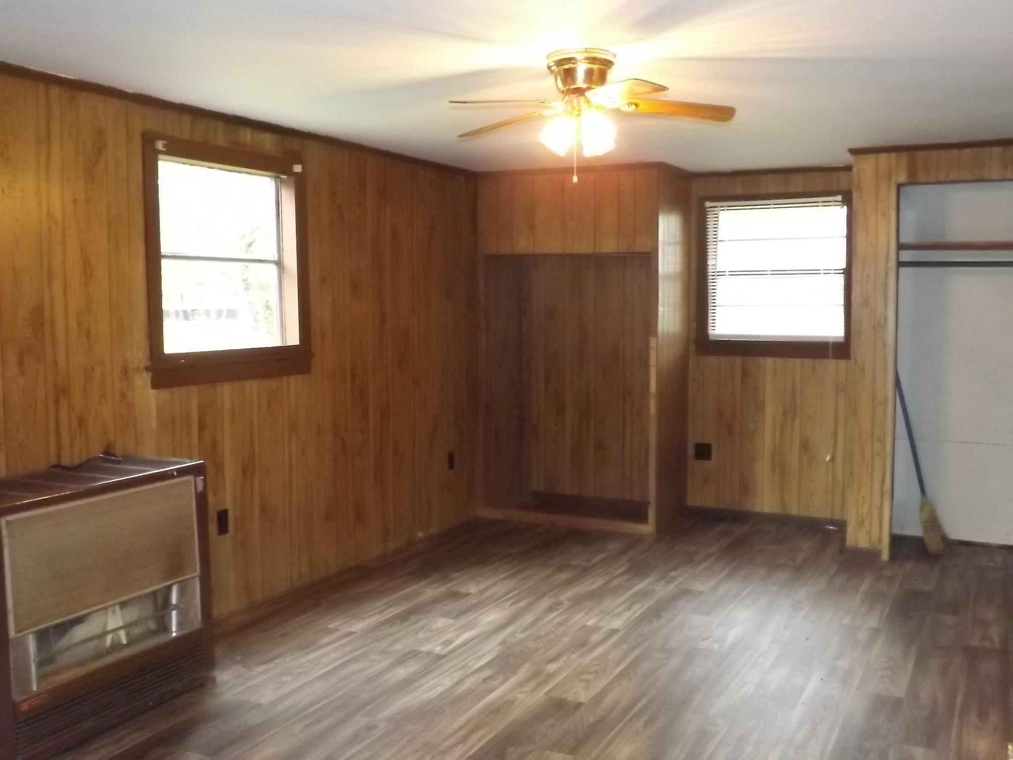 81 Hideout Road Manchester, TN 37355 - Photo 5 of 12 Bedroom featuring Ceiling Fan, and Laminate Flooring