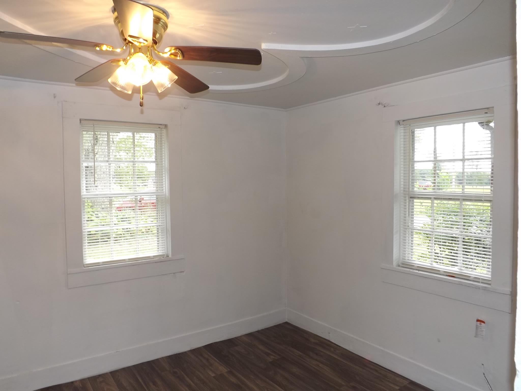 81 Hideout Road Manchester, TN 37355 - Photo 7 of 12 Bedroom featuring Ceiling Fan, and Laminate Flooring