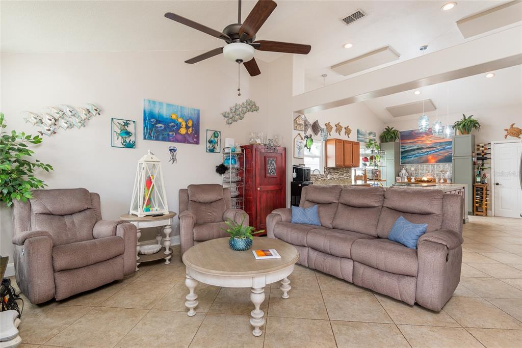 1301 Monte Lake Drive Valrico, FL 33596 - Photo 14 of 36 a living room with furniture and a wooden floor