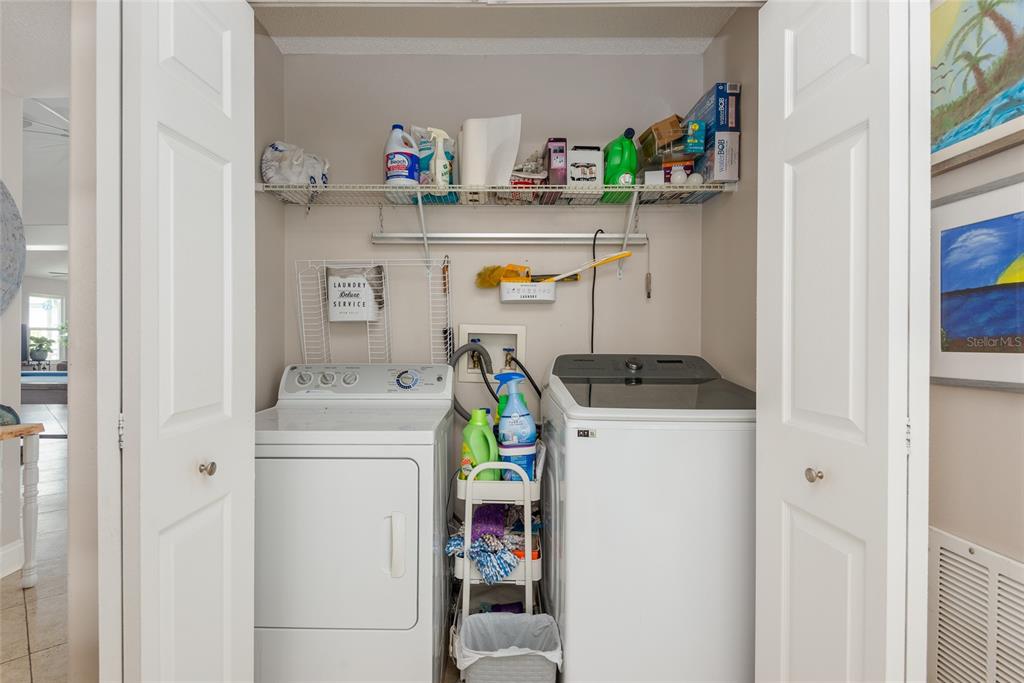 1301 Monte Lake Drive Valrico, FL 33596 - Photo 15 of 36 a utility room with fridge dryer and washer