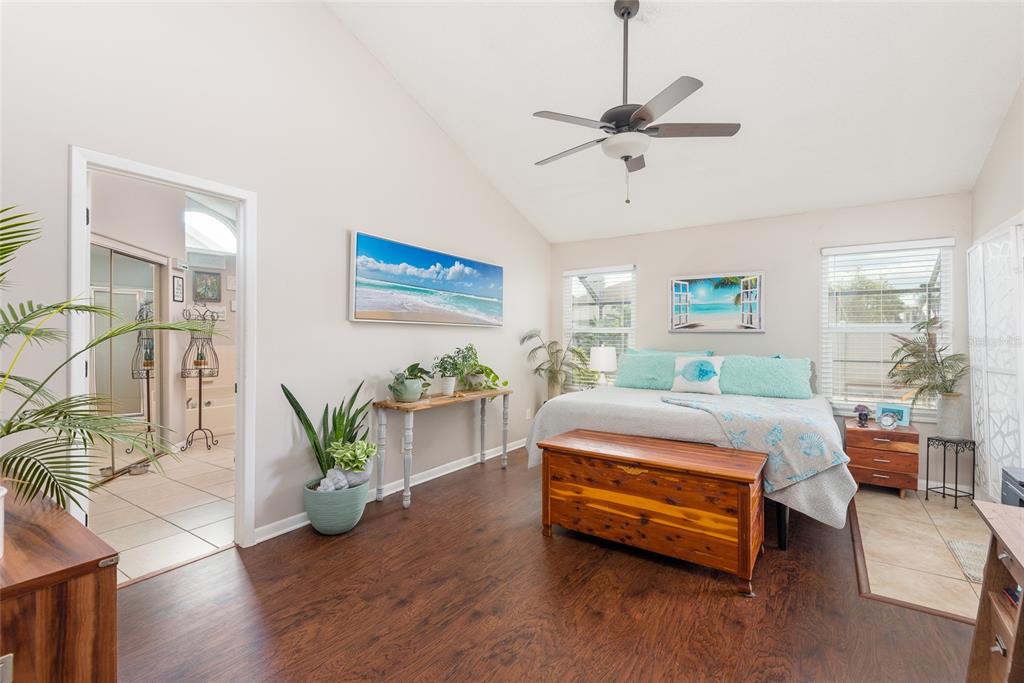 1301 Monte Lake Drive Valrico, FL 33596 - Photo 23 of 36 a bedroom with bed and a table