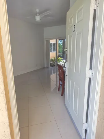 a view of entryway with livingroom