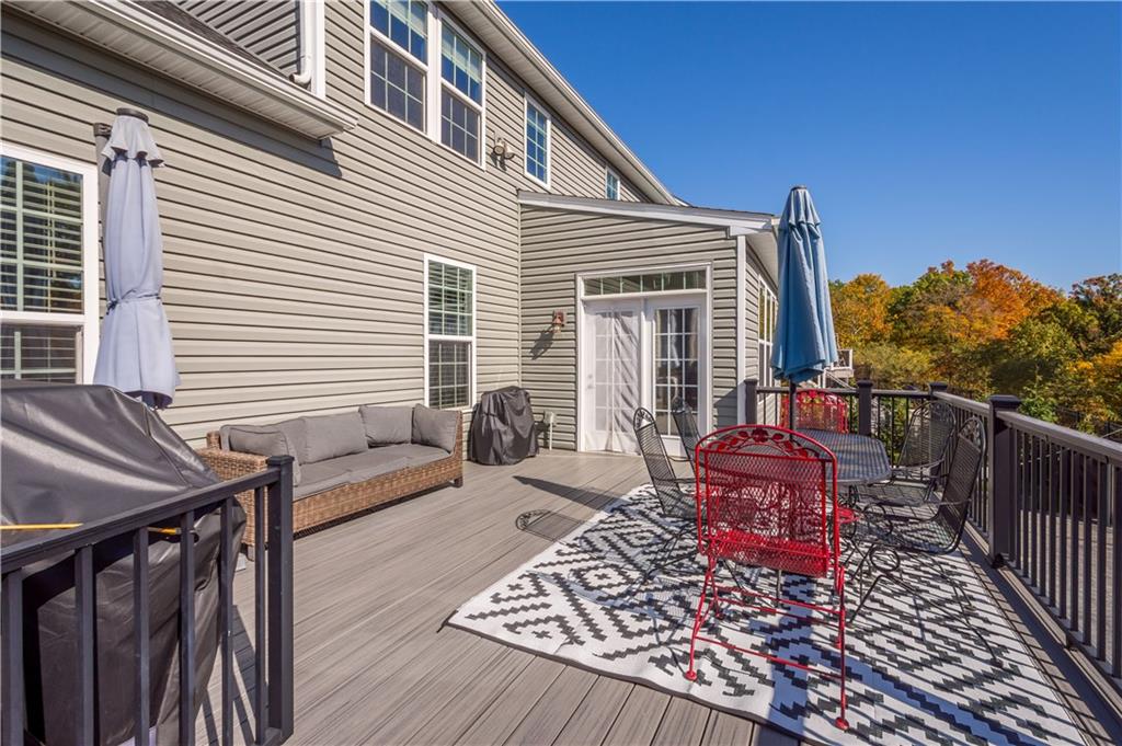 217 Sonni Lane McKees Rocks, PA 15136 - Photo 2 of 34 a balcony with furniture and wooden floor