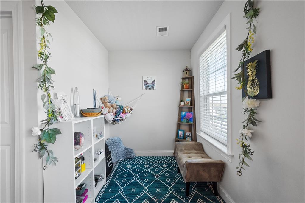 217 Sonni Lane McKees Rocks, PA 15136 - Photo 22 of 34 a living room with furniture and a potted plant