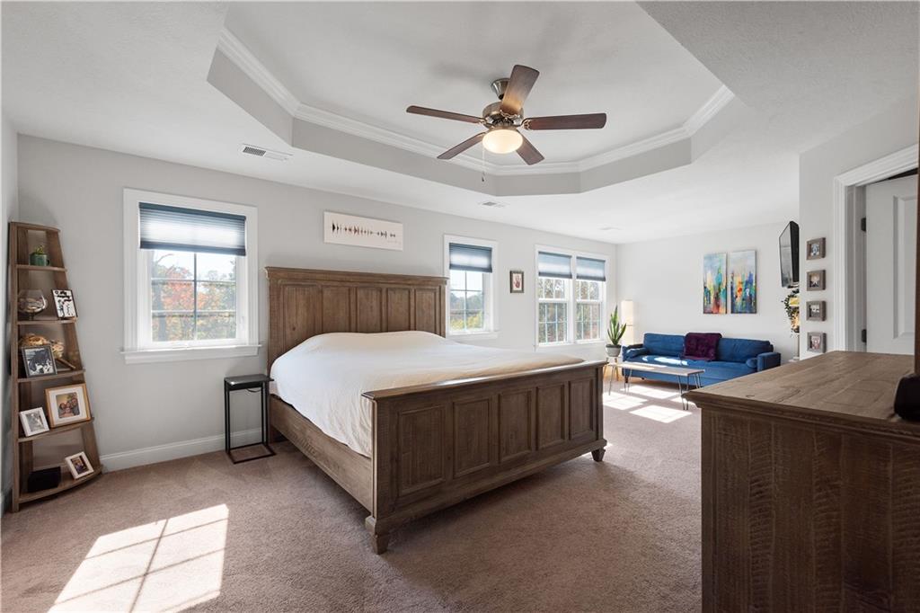 217 Sonni Lane McKees Rocks, PA 15136 - Photo 25 of 34 a bed room with a bed and a chandelier