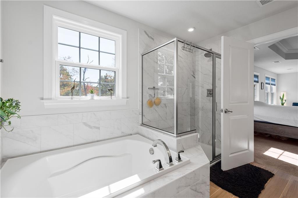 217 Sonni Lane McKees Rocks, PA 15136 - Photo 28 of 34 a bathroom with a bathtub and a shower