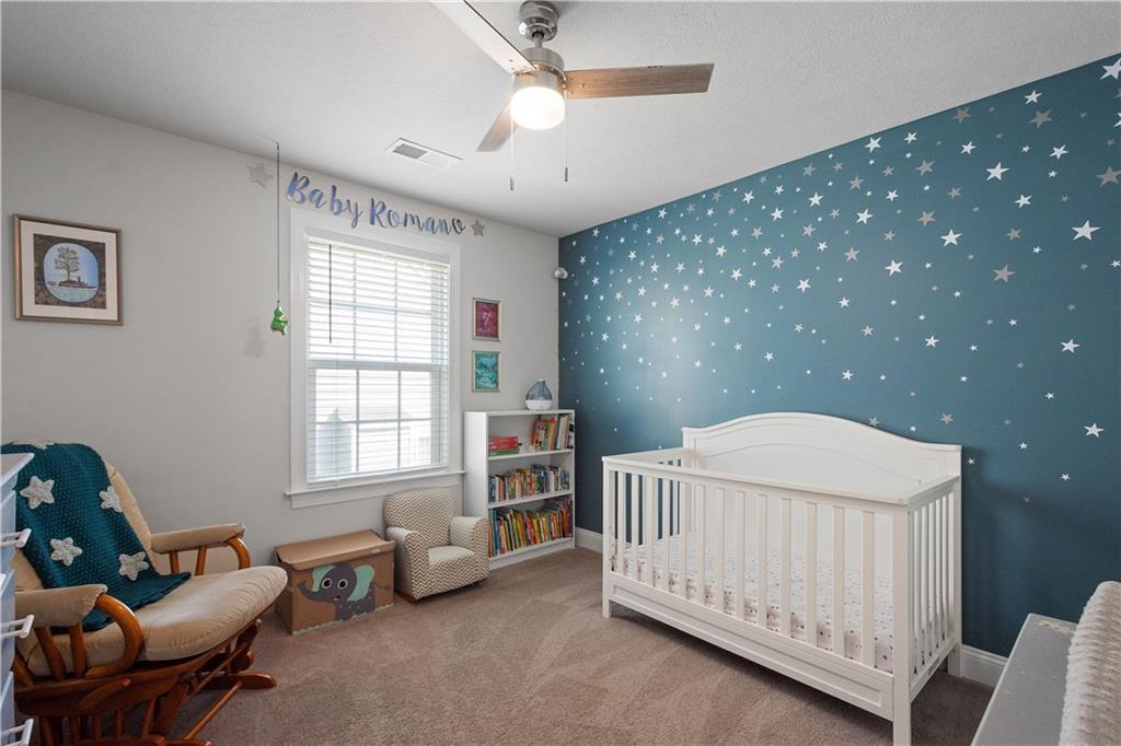 217 Sonni Lane McKees Rocks, PA 15136 - Photo 29 of 34 a bedroom with furniture and a window