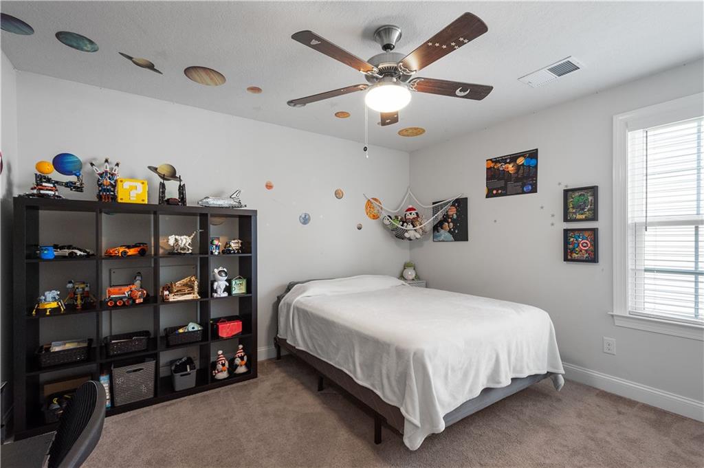 217 Sonni Lane McKees Rocks, PA 15136 - Photo 30 of 34 a bedroom with a bed window and a window