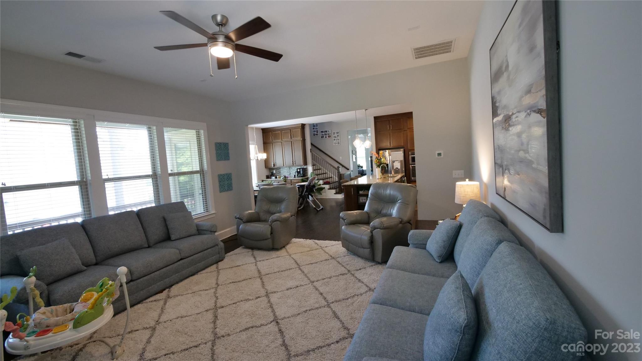 4912 Killian Crossing Drive Denver, NC 28037 - Photo 11 of 38 a living room with furniture and a large window
