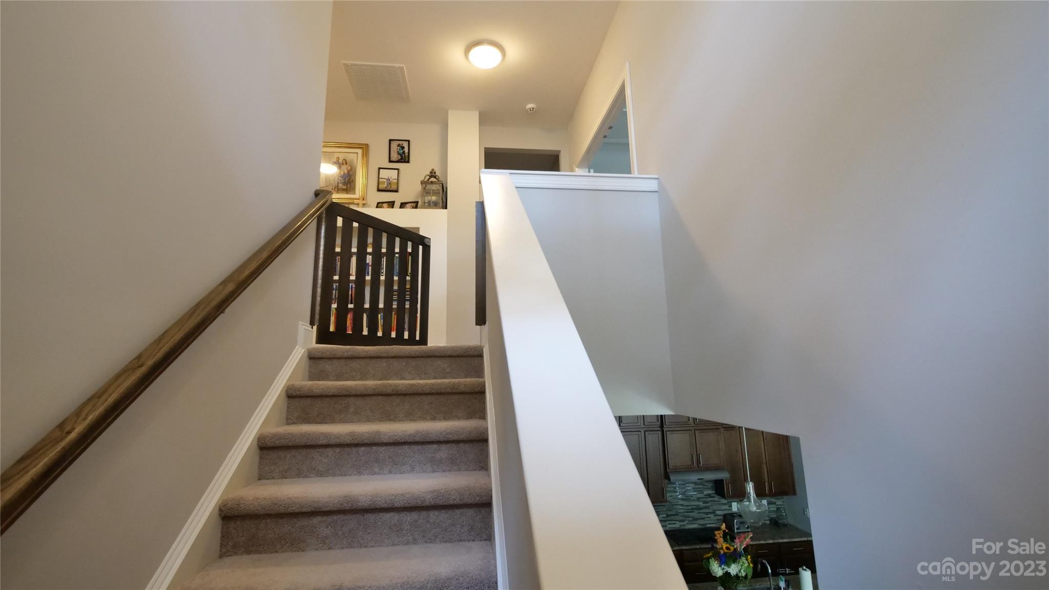 4912 Killian Crossing Drive Denver, NC 28037 - Photo 20 of 38 a view of entryway and hall with wooden floor