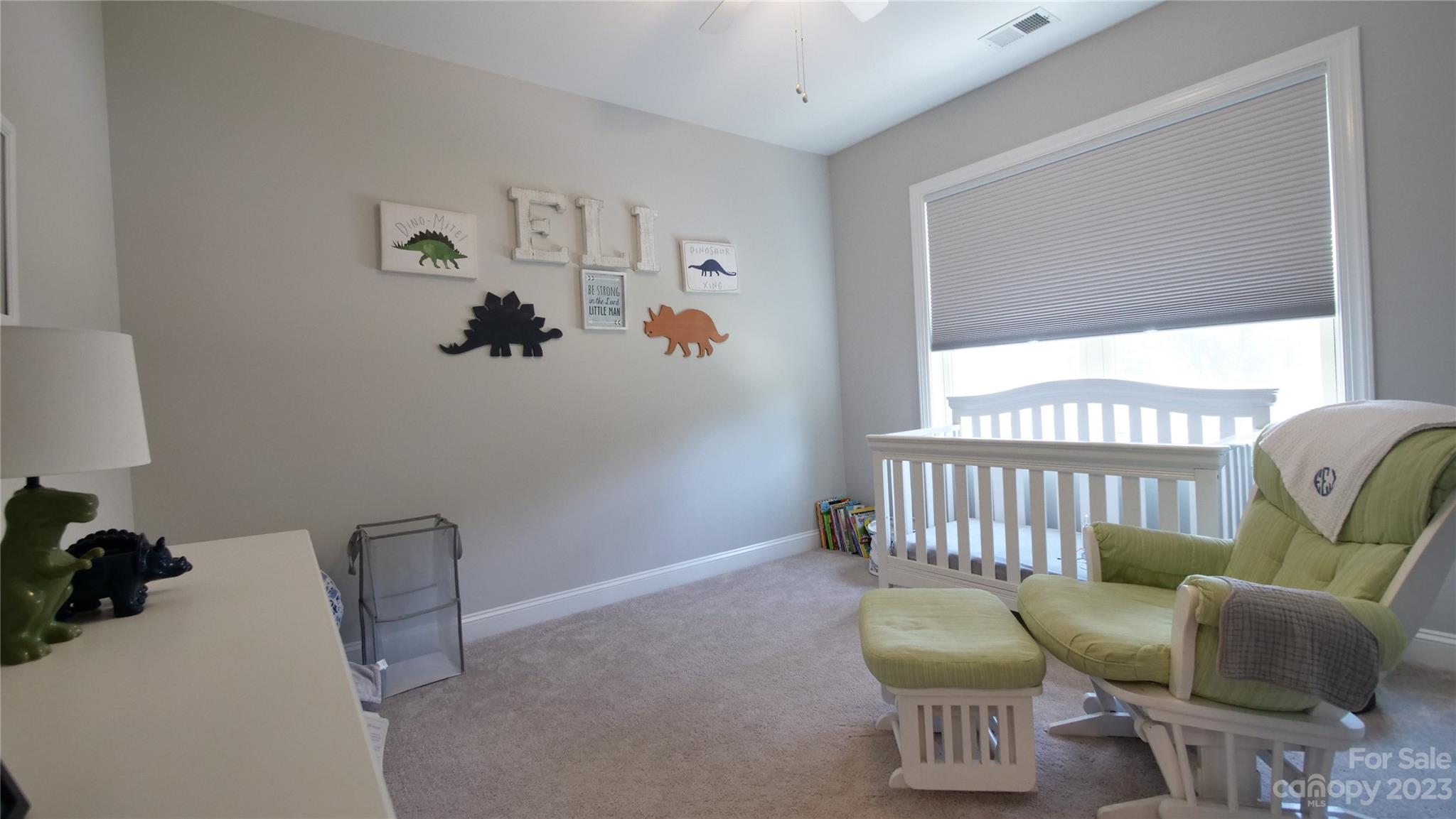 4912 Killian Crossing Drive Denver, NC 28037 - Photo 22 of 38 a living room with furniture and a window