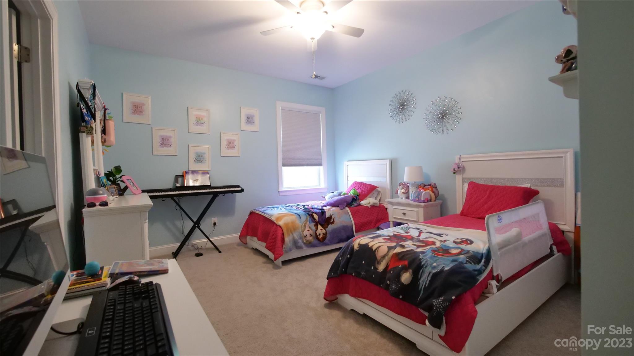 4912 Killian Crossing Drive Denver, NC 28037 - Photo 25 of 38 a bedroom with two beds and a flat screen tv