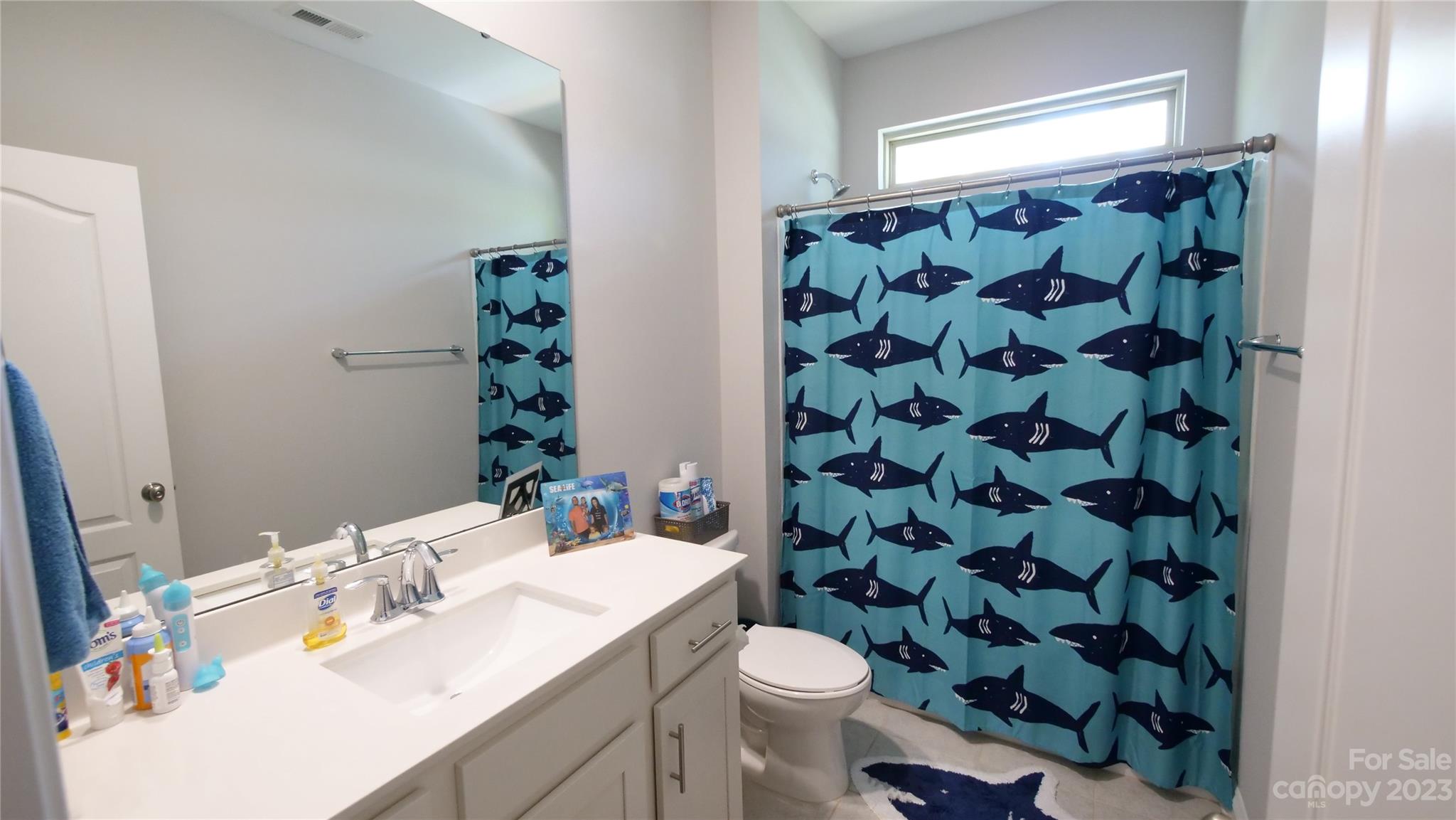4912 Killian Crossing Drive Denver, NC 28037 - Photo 28 of 38 a bathroom with a sink toilet and shower