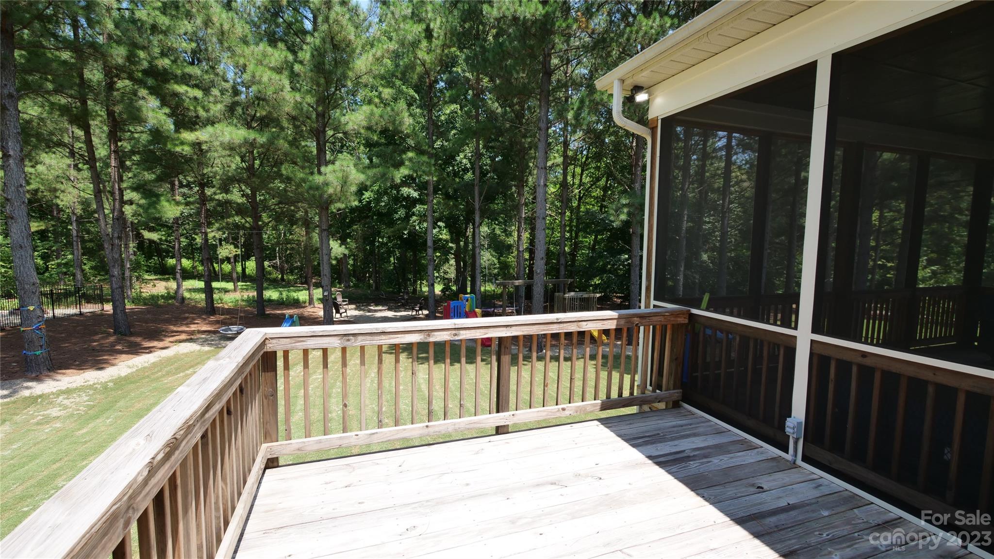4912 Killian Crossing Drive Denver, NC 28037 - Photo 32 of 38 a view of balcony with wooden floor and fence
