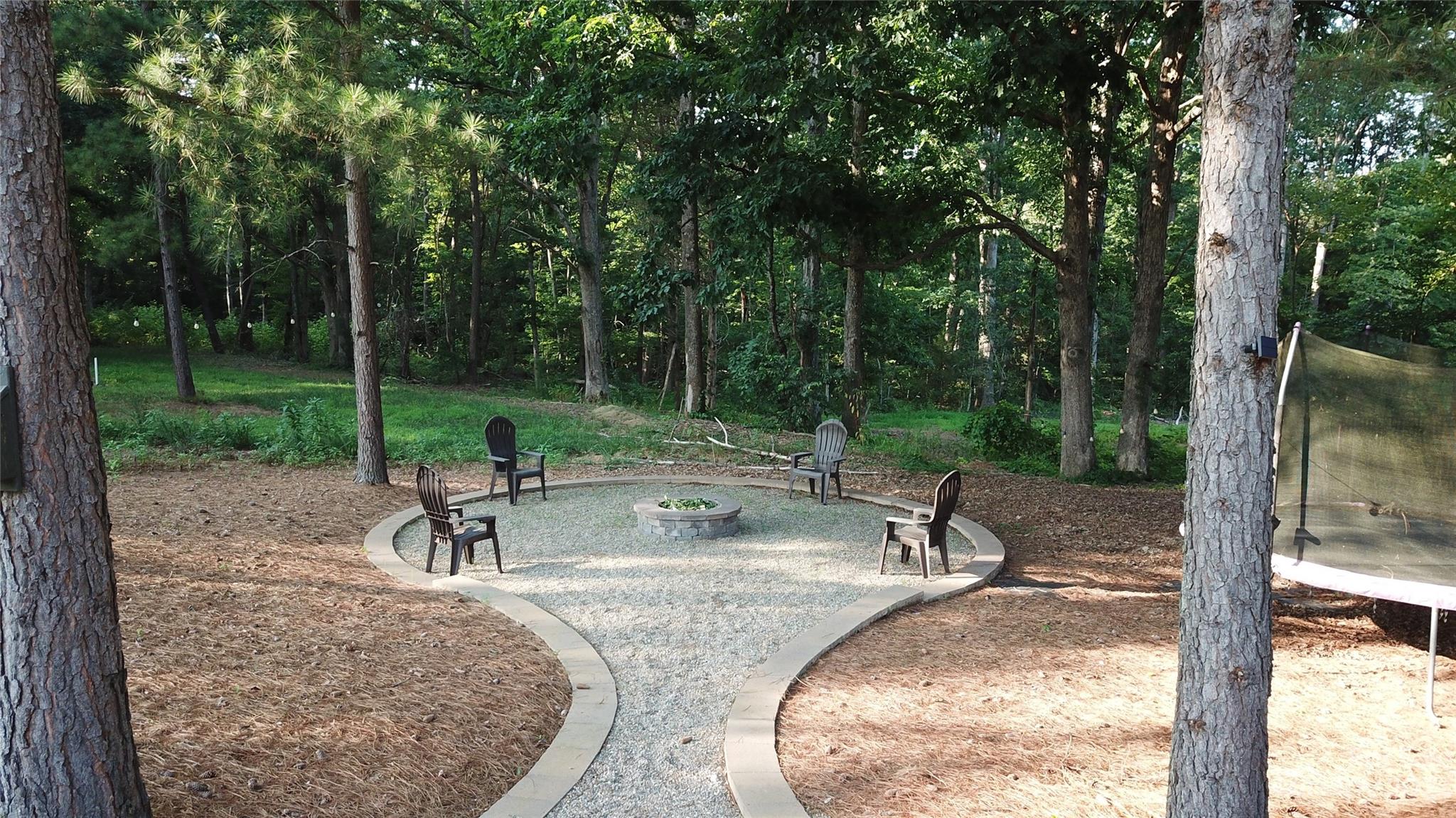 4912 Killian Crossing Drive Denver, NC 28037 - Photo 35 of 38 a view of a backyard with a slide