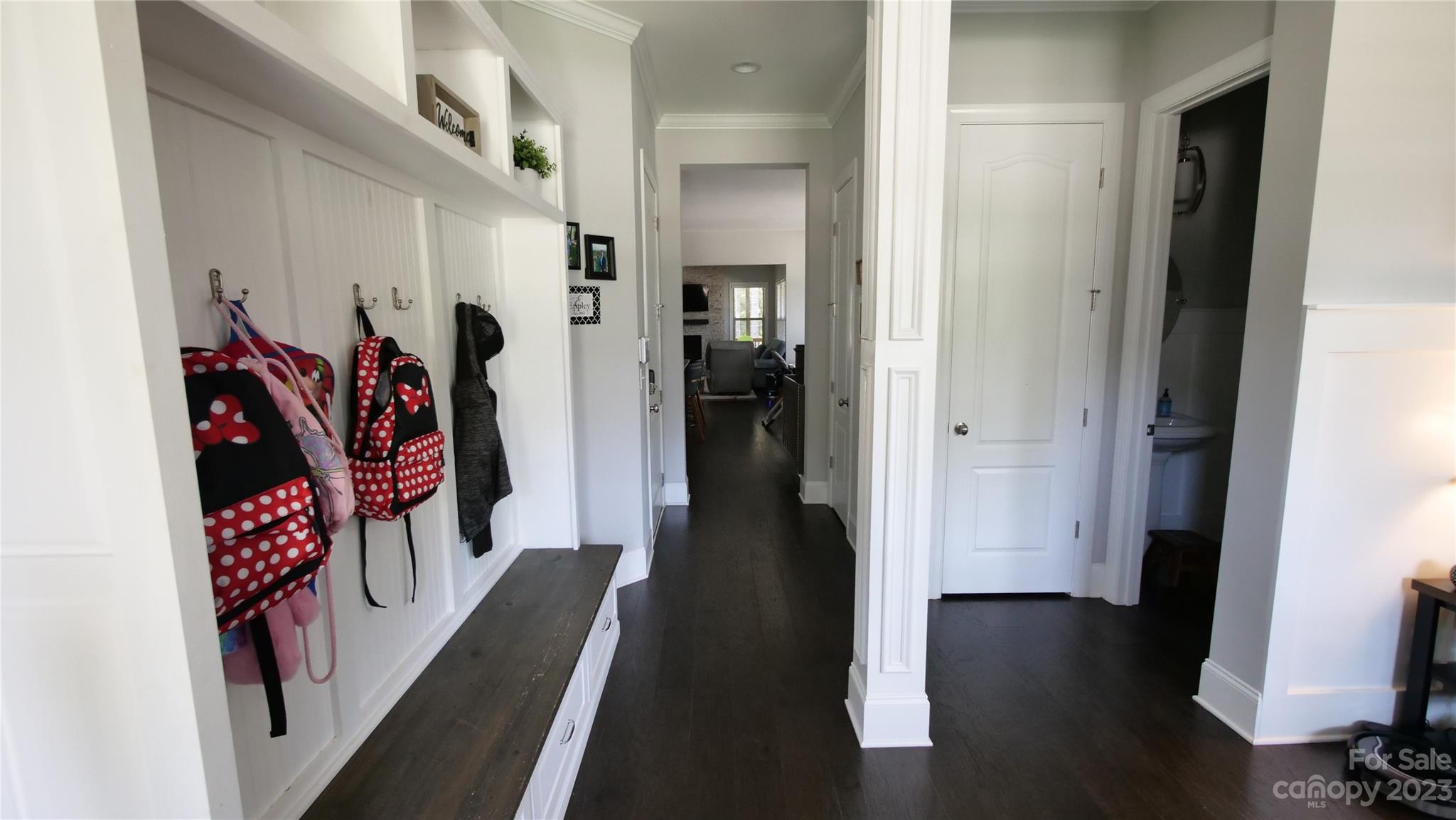 4912 Killian Crossing Drive Denver, NC 28037 - Photo 6 of 38 a view of a hallway with wooden floor and stairs