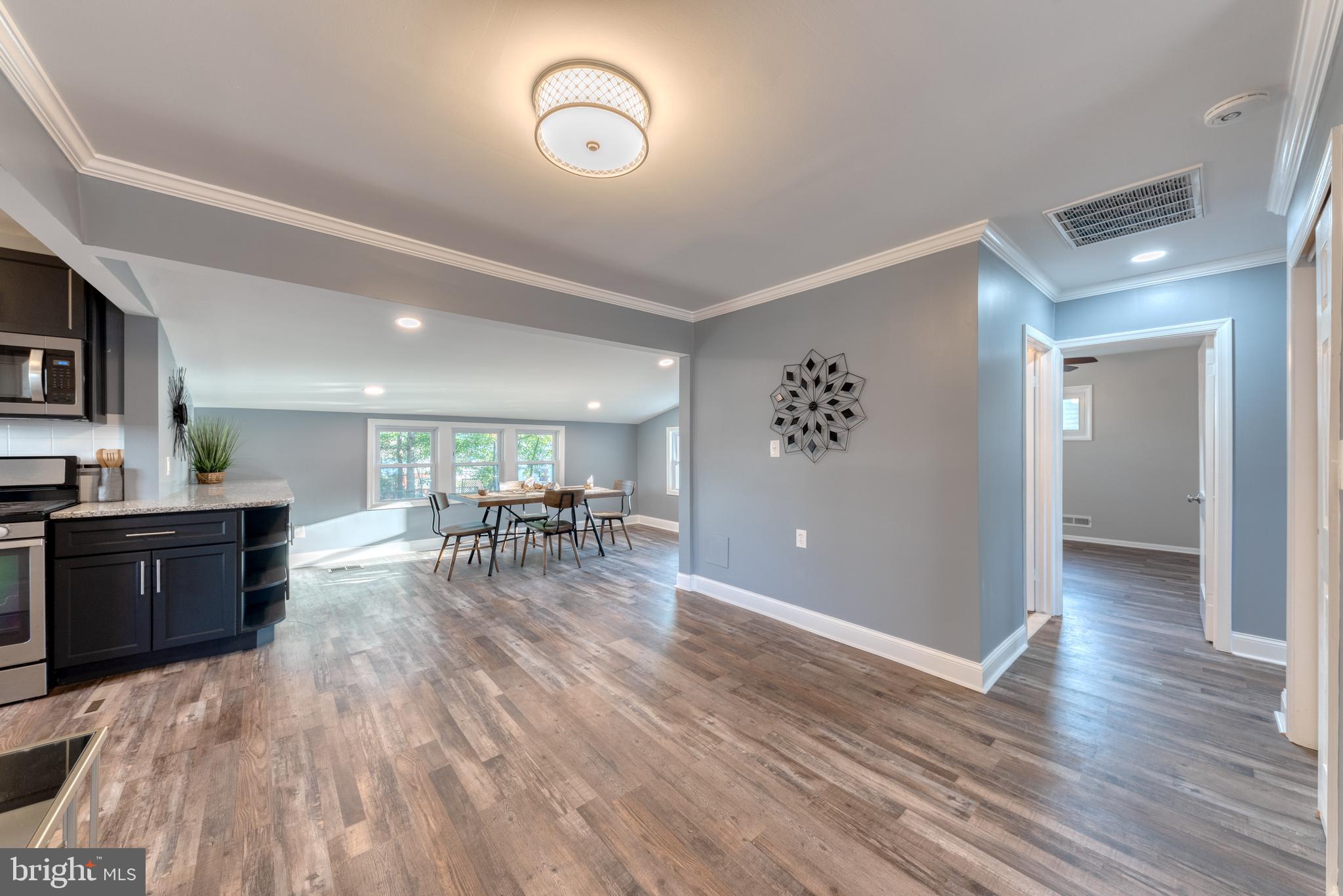 8722 Roper Road Baltimore, MD 21234 - Photo 6 of 23 LR leads to brand new kitchen and dining