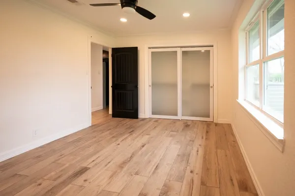 a view of an empty walk in closet