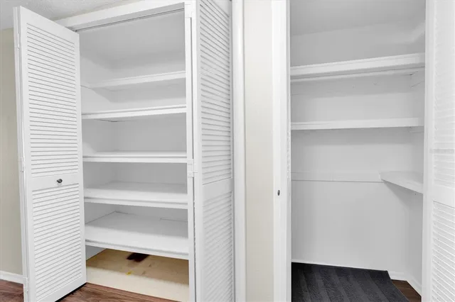 a storage room with a wooden floor