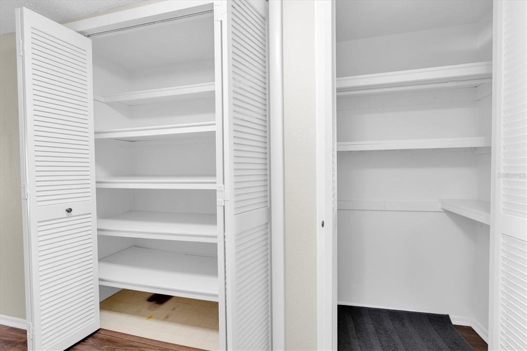 2417 Persian Drive, Unit 23 Clearwater, FL 33763 - Photo 22 of 48 a storage room with a wooden floor