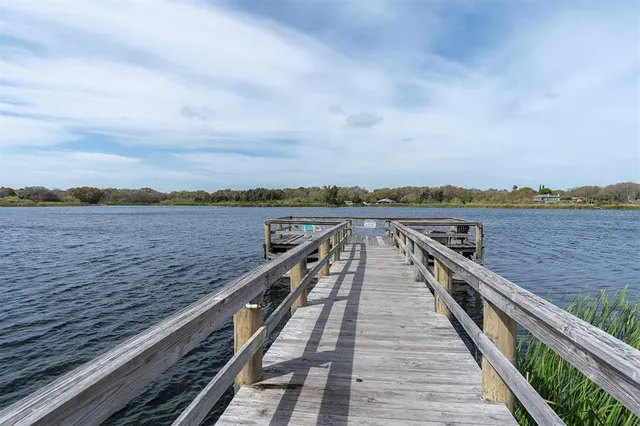a view of wooden floor with a lake