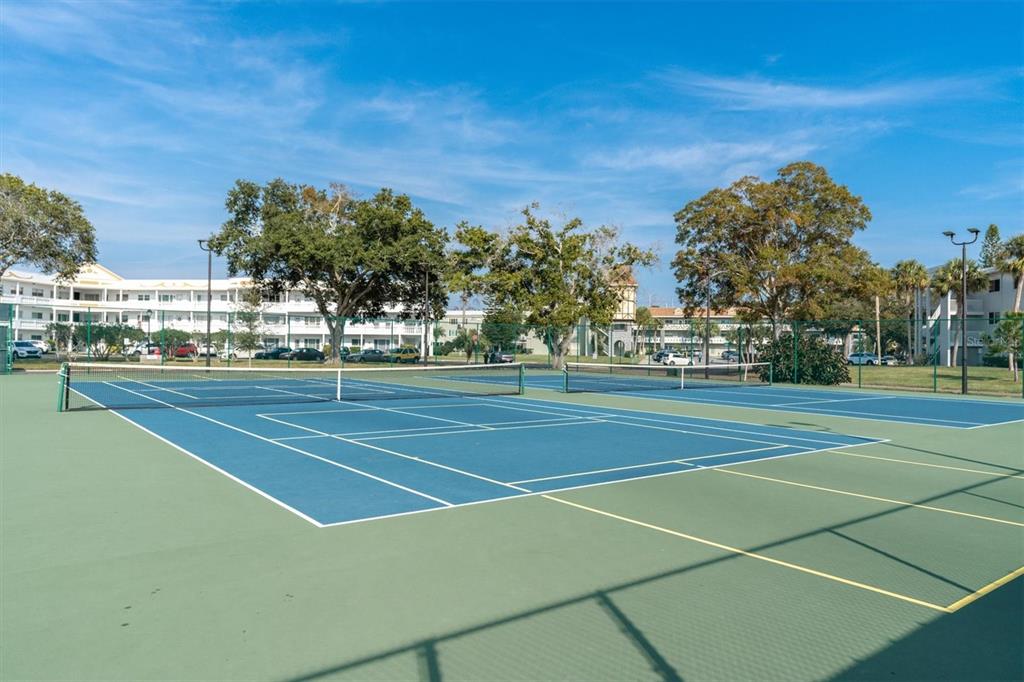 2417 Persian Drive, Unit 23 Clearwater, FL 33763 - Photo 45 of 48 a view of a tennis court