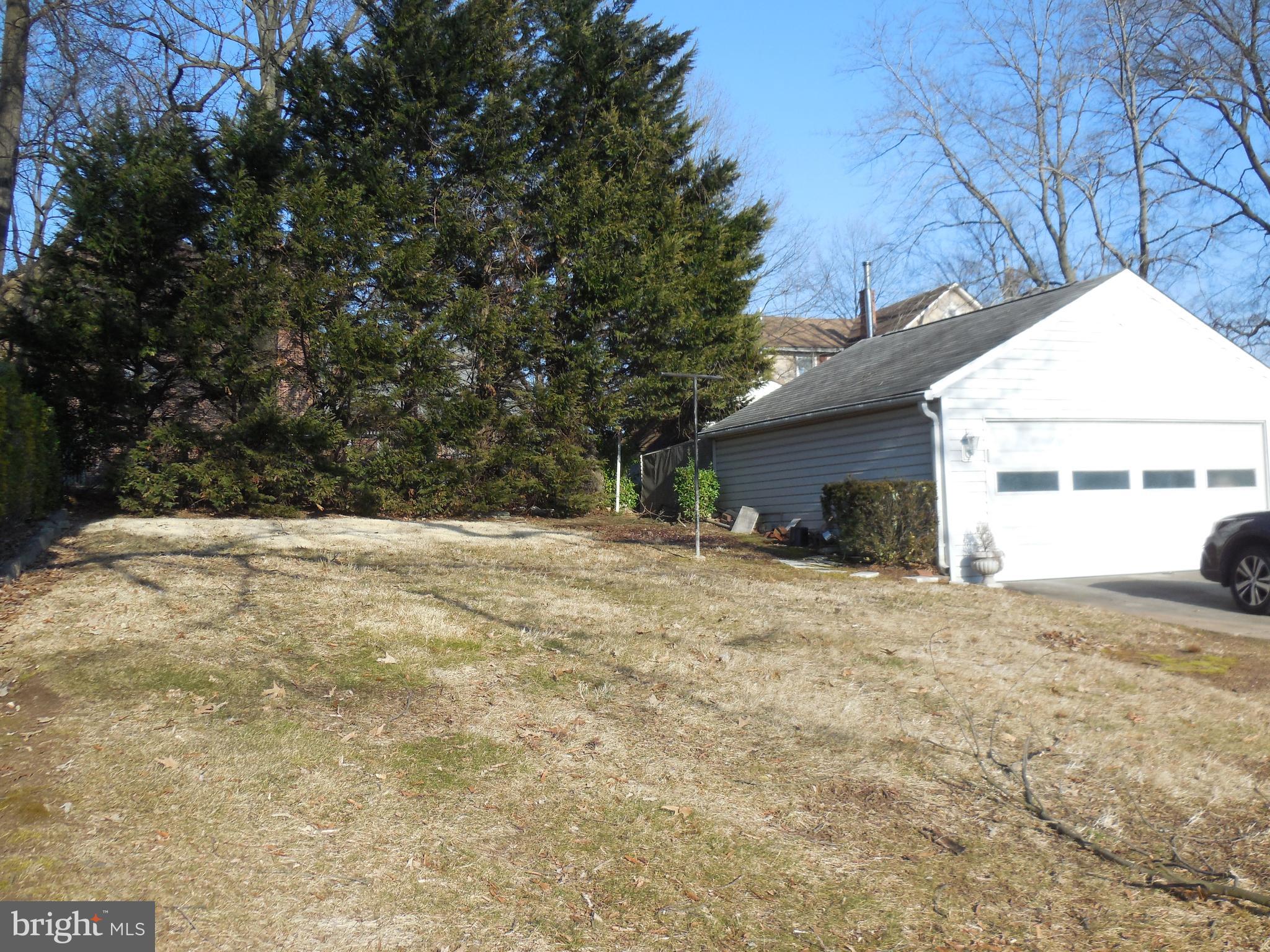 8200 Philadelphia Road Baltimore, MD 21237 - Photo 8 of 41 a view of a house with a yard