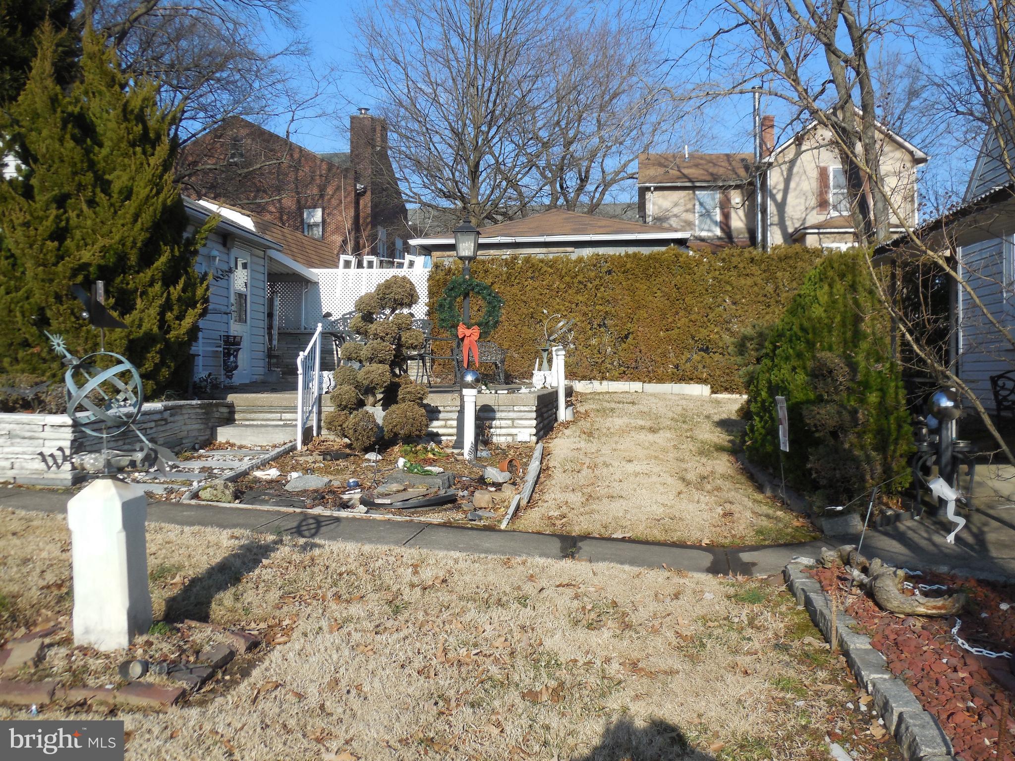 8200 Philadelphia Road Baltimore, MD 21237 - Photo 10 of 41 a view of a yard in front of the house