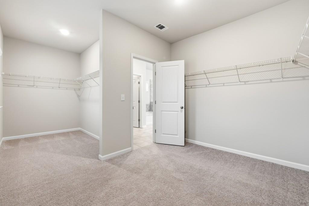 1849 Hanwoo Lane Powder Springs, GA 30127 - Photo 28 of 47 an empty room with an entryway