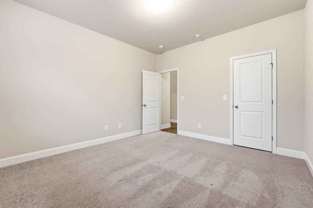 1849 Hanwoo Lane Powder Springs, GA 30127 - Photo 31 of 47 an empty room with an entryway