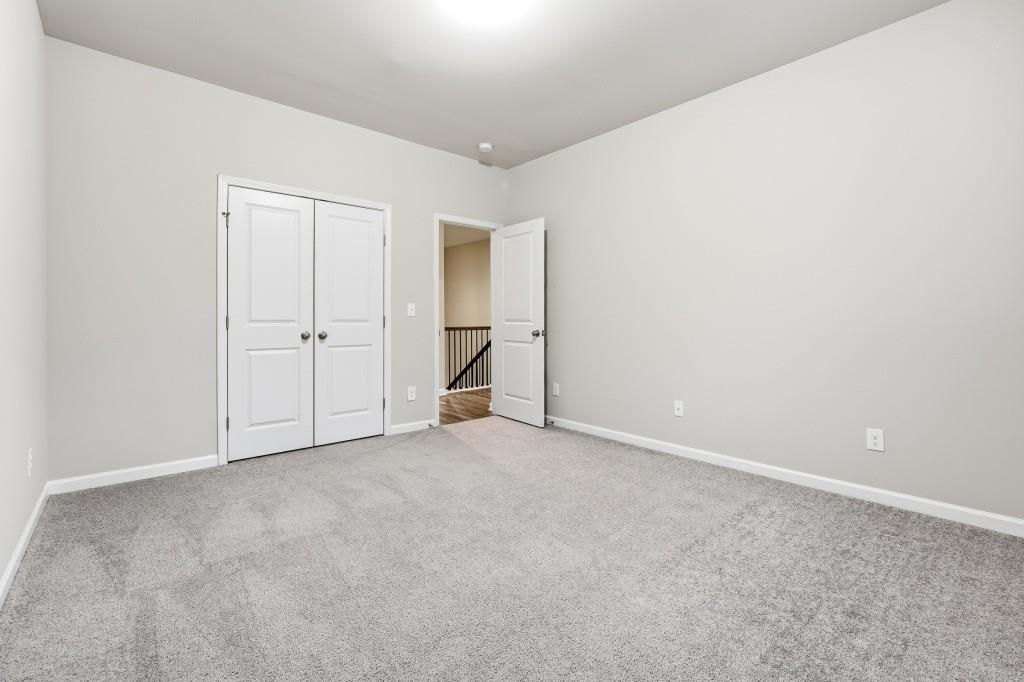 1849 Hanwoo Lane Powder Springs, GA 30127 - Photo 35 of 47 an empty room with an entryway