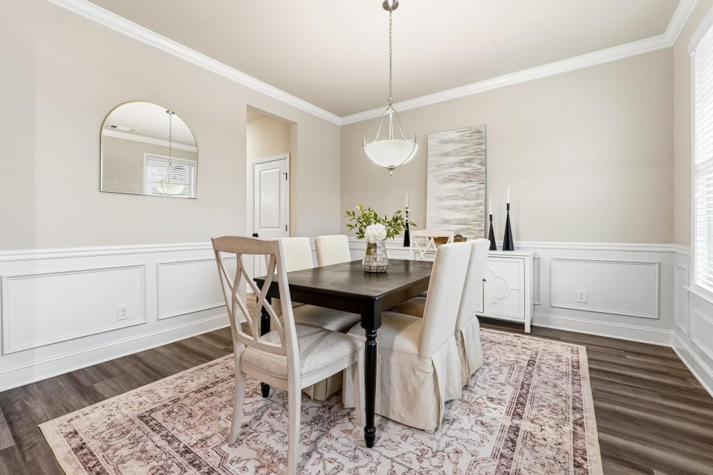 1849 Hanwoo Lane Powder Springs, GA 30127 - Photo 8 of 47 a view of a dining room with furniture