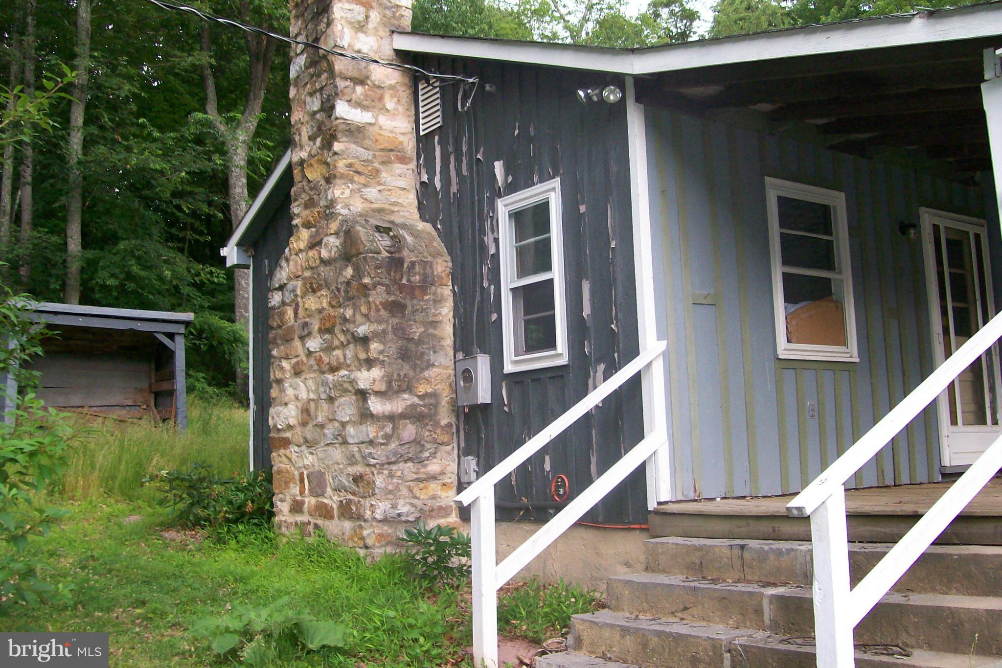 114 Moorehead Road Gore, VA 22637 - Photo 7 of 25 a front view of a house with a yard