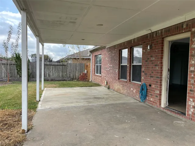 a view of a building with a entrance gate