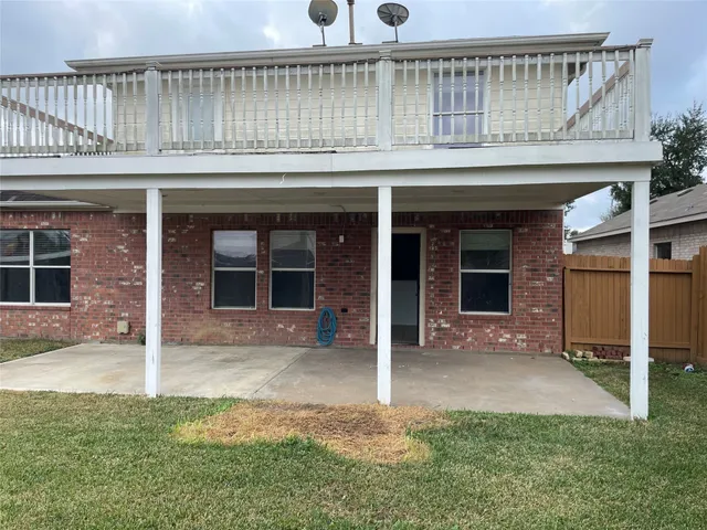 a kitchen with a sink and a granite top