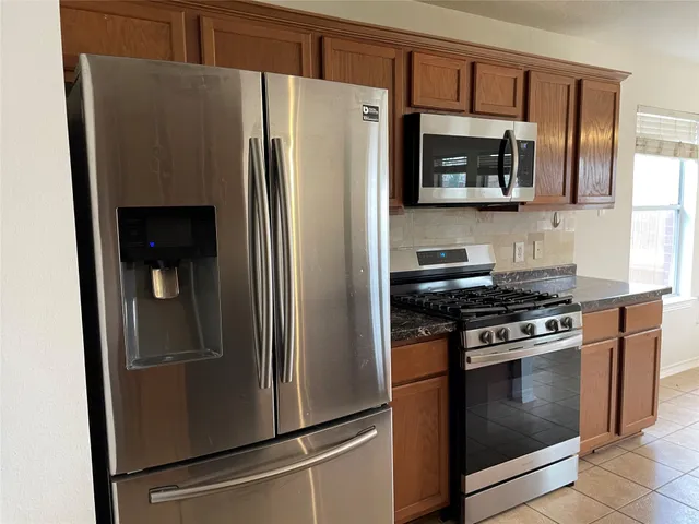 a view of a livingroom with wooden floor