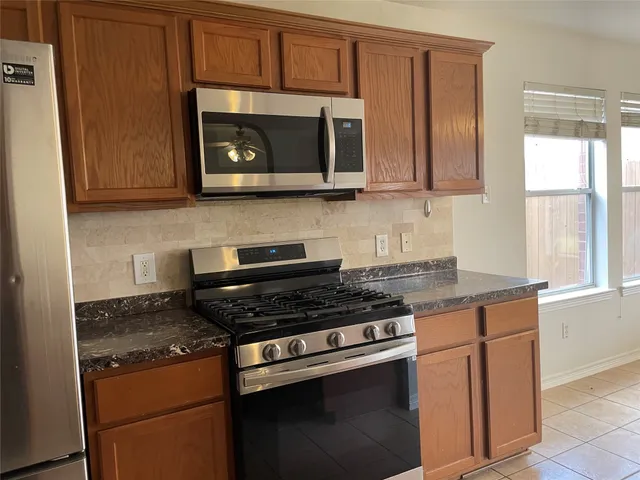 a view of a bathroom with a glass door