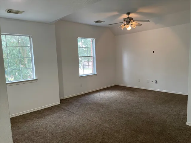 a view of staircase with wooden floor