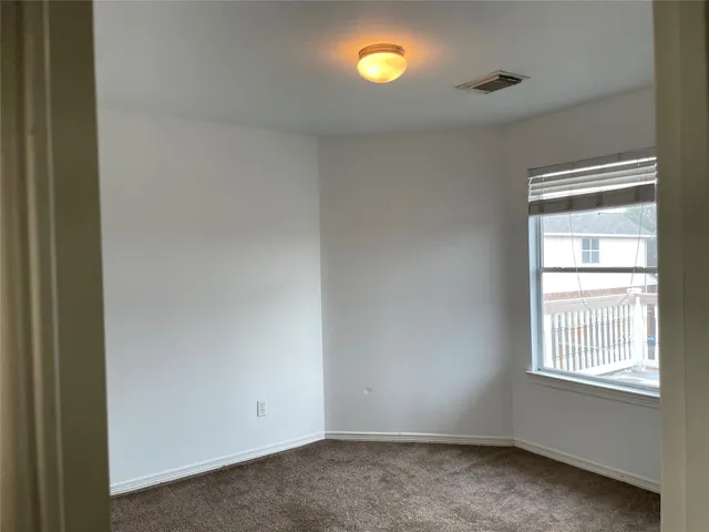 a view of a city from a balcony