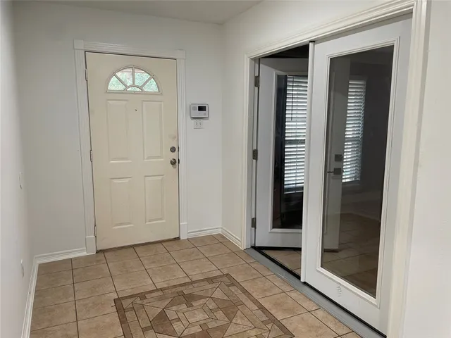 a view of a livingroom with wooden floor