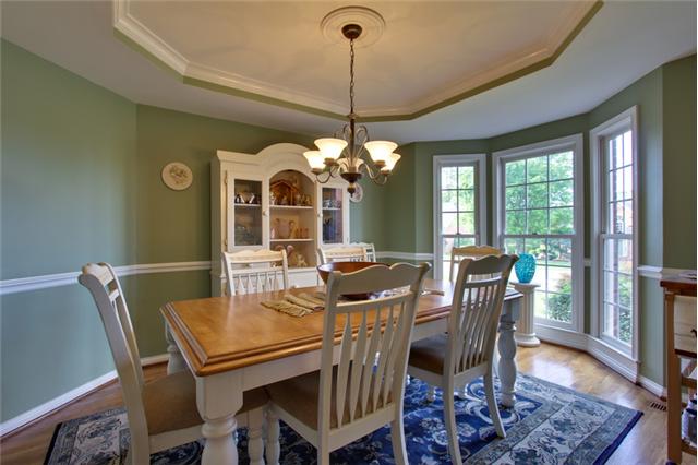 Dinner guest will enjoy the elegant Formal Dining Room with trey ceiling.