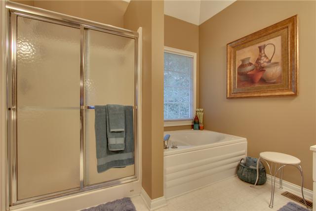 226 Savannah Ridge Murfreesboro, TN 37127 - Photo 12 of 16 The Master Bath features two separate vanity areas, two walk-in closets and separate jacuzzi & shower!