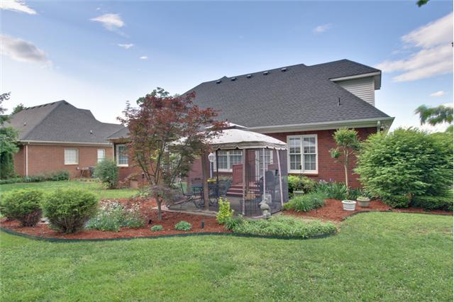 226 Savannah Ridge Murfreesboro, TN 37127 - Photo 15 of 16 Professionally landscaped backyard with an attached, screened gazebo that will remain with the property.