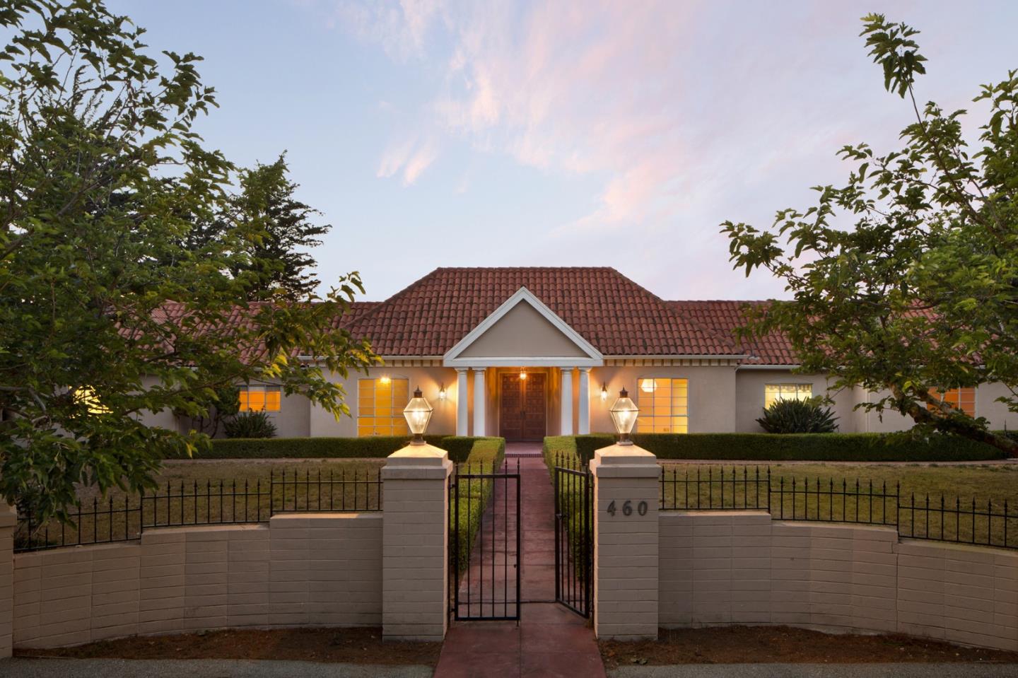 460 Pullman Road Hillsborough, CA 94010 - Photo 2 of 34 a front view of a house with a garden